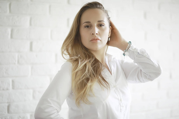 young woman in white blouse  - Foto, Bild