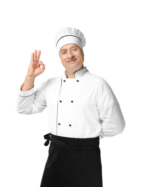 Male chef in uniform on white background - Zdjęcie, obraz