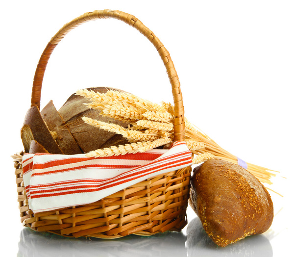 tasty rye breads with ears in basket, isolated on white - Photo, Image