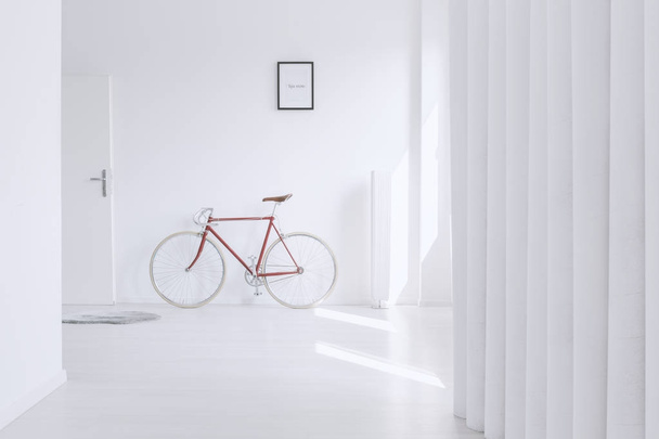 Red bike against wall - Photo, image