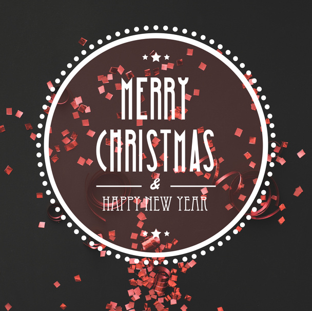 Christmas greeting with red confetti  - Photo, Image