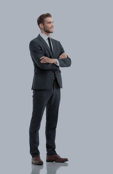 Side view of a smiling businessman standing , On white backgroun - Fotoğraf, Görsel