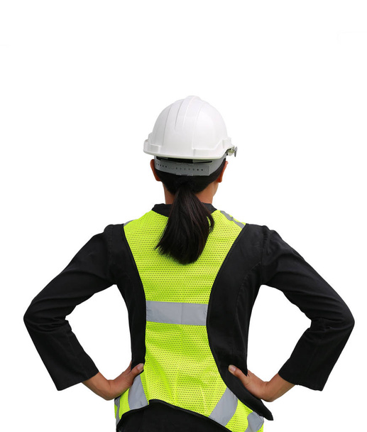 Back view of female construction worker isolated on white background - Foto, Bild