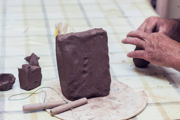 A piece of clay for modeling on the table - Photo, Image