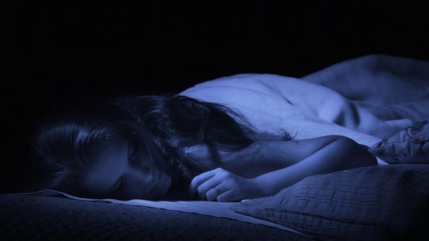 Sensual girl sleeping in the bedroom - Foto, afbeelding