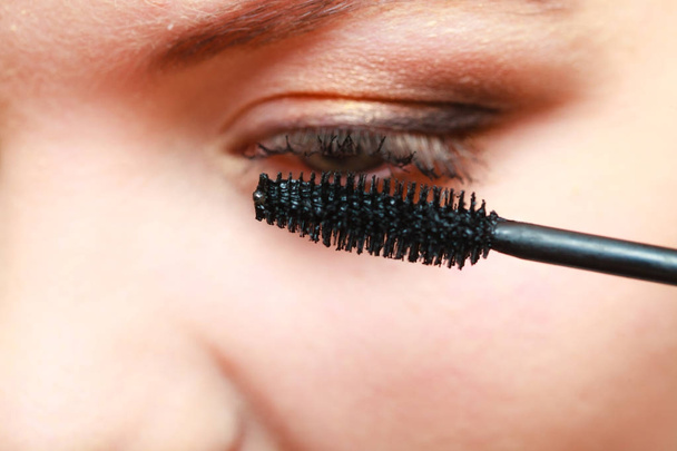 Close up woman getting make up, mascara - Photo, Image