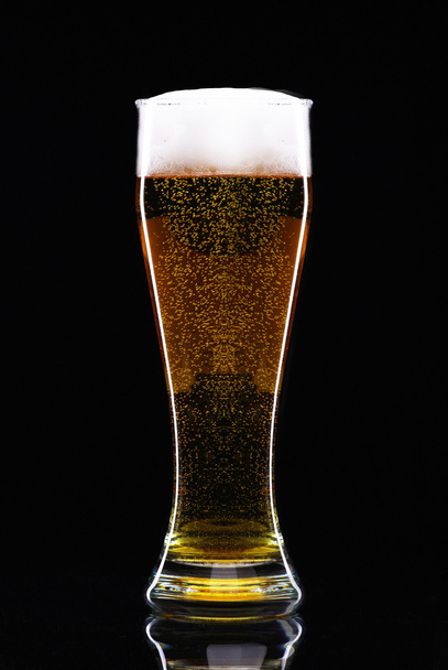Glass of beer with barel - 写真・画像