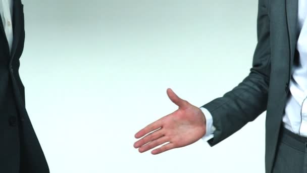 Two business men shaking hands slow motion - Filmmaterial, Video