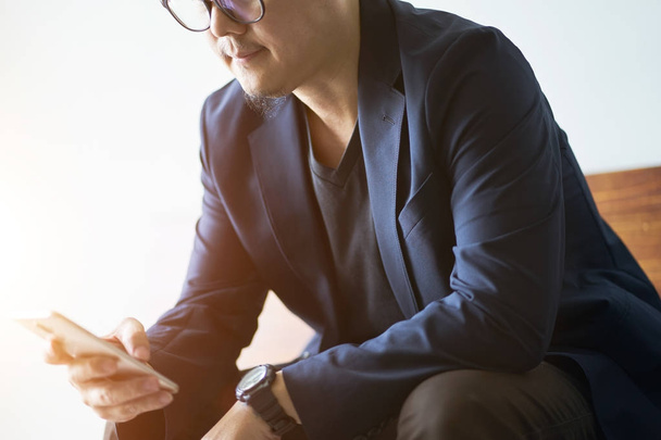 Closeup of businessman using smartphone . - Fotografie, Obrázek