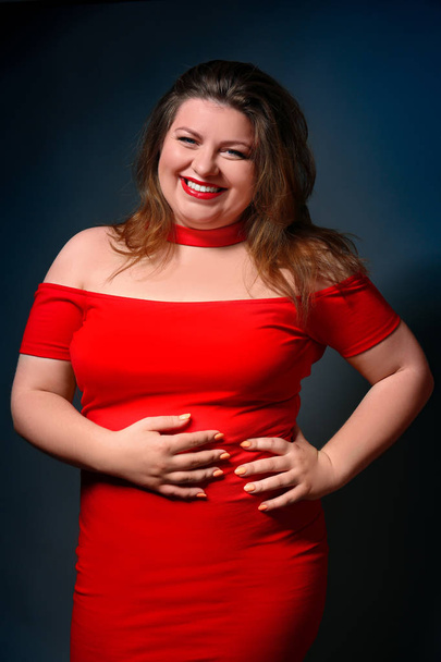 Overweight woman in beautiful red dress  - Foto, imagen