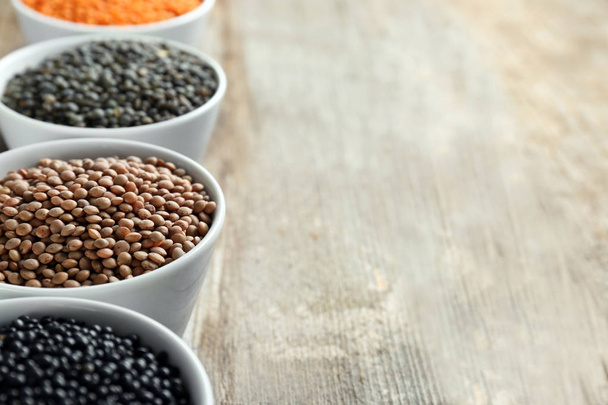 Bowls with different lentils  - Фото, изображение