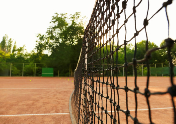 Tennis net on court  - Foto, afbeelding