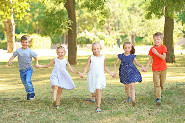 Group of children in park on sunny day - Foto, Imagem