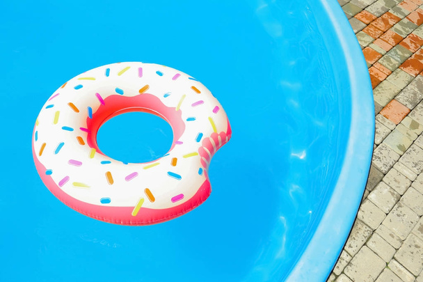 Colorful inflatable donut   - 写真・画像