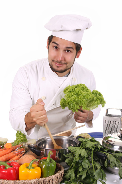 Young chef preparing lunch - Fotoğraf, Görsel