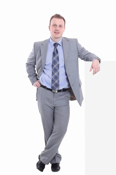 businessman is leaning on a virtual wall - Photo, image