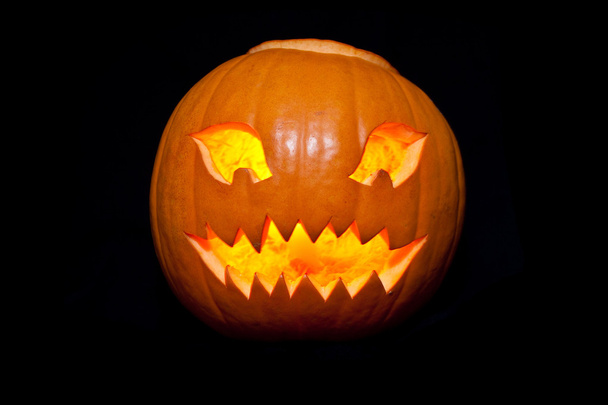 Halloween tök jack-o-lantern gyertya világít - Fotó, kép