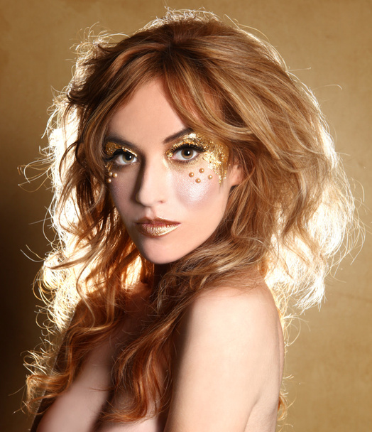 Beautiful Woman Adorned with Gold Leaf Cosmetics - Fotoğraf, Görsel