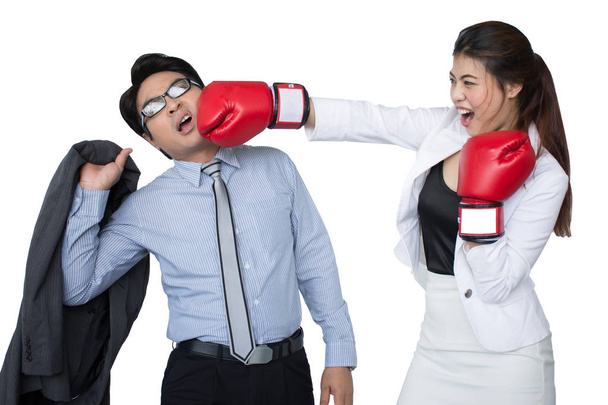 Portrait of professional businesswoman in suits and boxing gloves kicking his rival - Photo, Image
