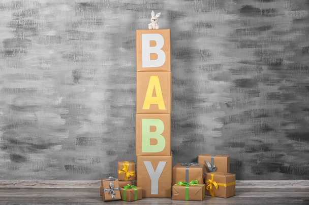 Composition with word BABY and gift boxes - Fotoğraf, Görsel