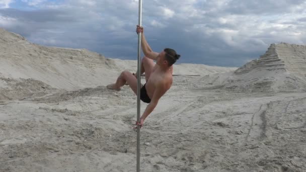 Man is a dancer on a pole. - Footage, Video