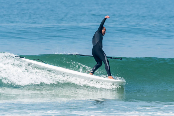 Debout paddle surfeur
 - Photo, image