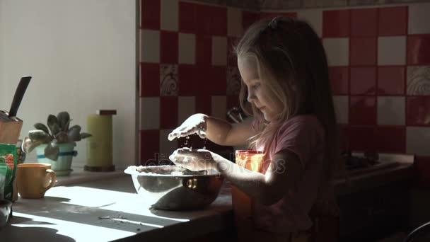 Girl preparing dough in bowl. - Footage, Video