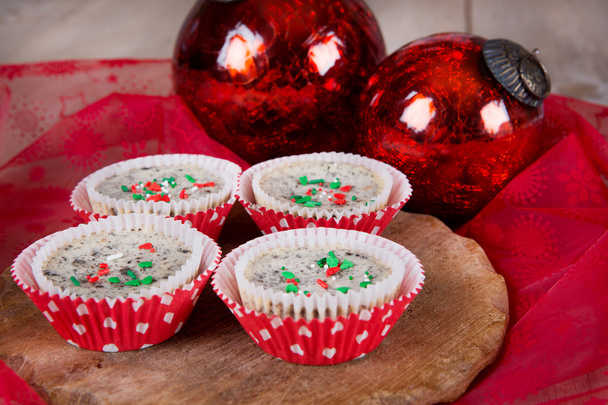 Christmas cookies and cream cheesecakes in muffin forms - Photo, Image