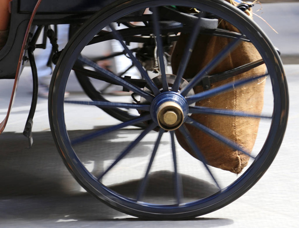 wheel of an ancient Carriage in moviment - Photo, Image