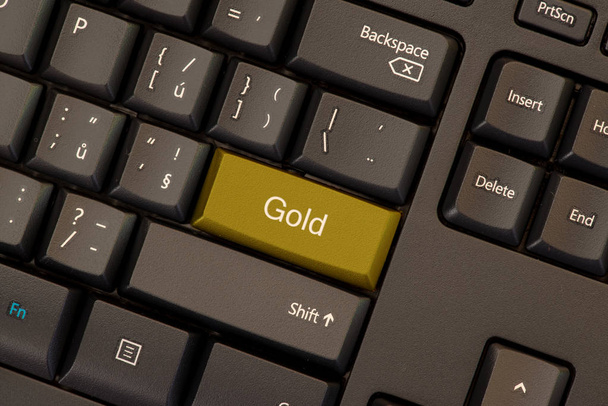Concepto del logotipo del oro
 - Foto, imagen