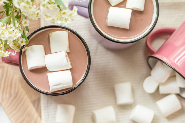 Marshmallows on top of hot cocoa in pink cup - Photo, Image