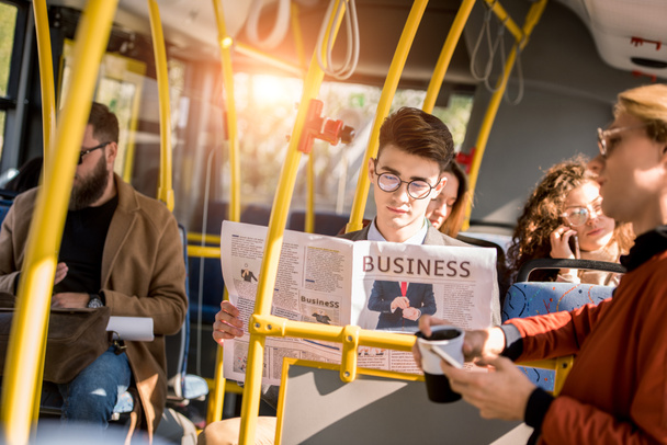 young businessman in bus - Foto, imagen