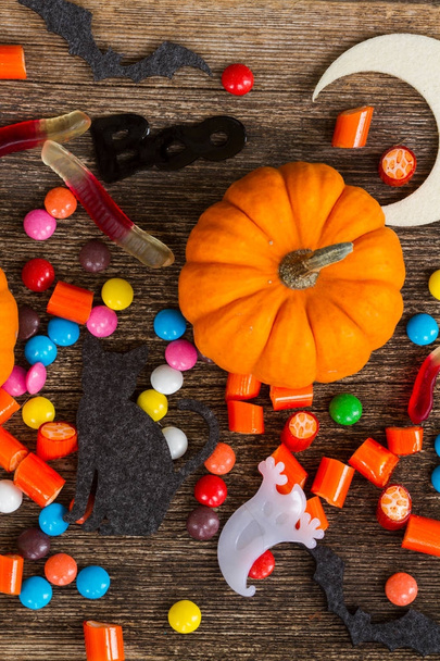 Colorful halloween candies on wood - Fotografie, Obrázek