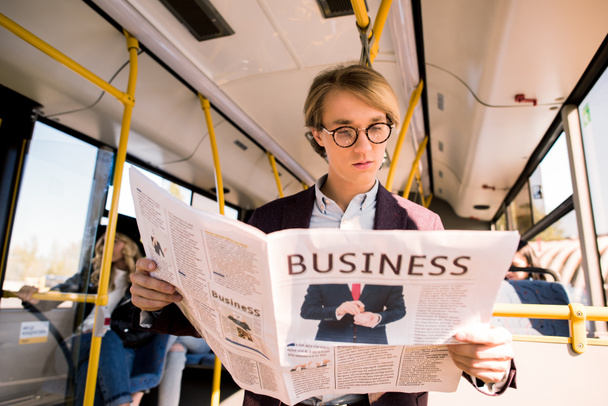 young businessman in bus - Фото, изображение