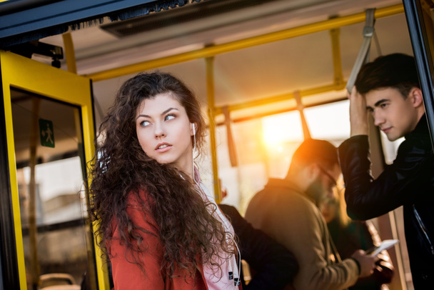 Young woman entering bus - Foto, Imagem