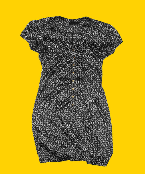 Női alkalmi ruha sárga háttér - Fotó, kép