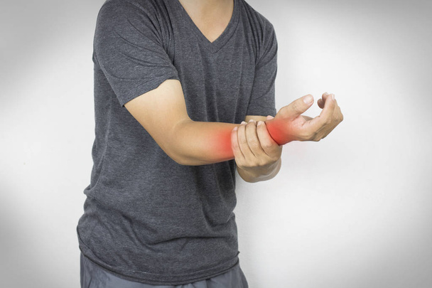 man holding arm ache, concept as health care - Foto, imagen