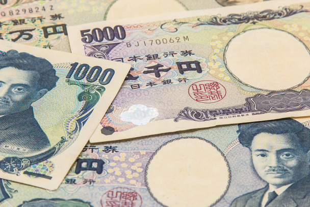 pile of many type japan banknotes background, yen currency. - Photo, Image
