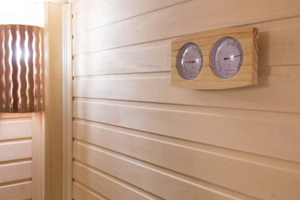 interior of the sauna. Measurement of humidity and temperature - Fotoğraf, Görsel