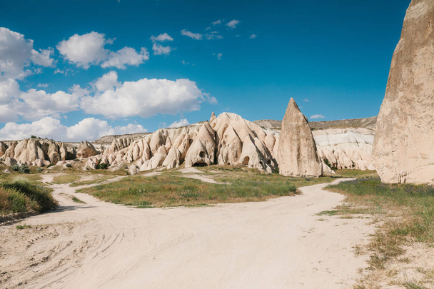 Beautiful view of the hills of Cappadocia. One of the sights of Turkey. Tourism, travel, beautiful landscapes, nature. Road. - Photo, Image