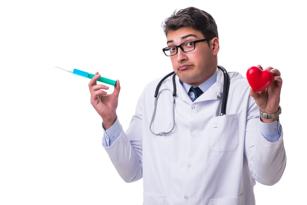 Fiatal férfi kardiológus orvos, gazdaság, elszigetelt fehér szív - Fotó, kép