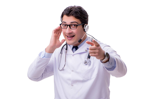 Young doctor with phone headset isolated on white - Photo, Image