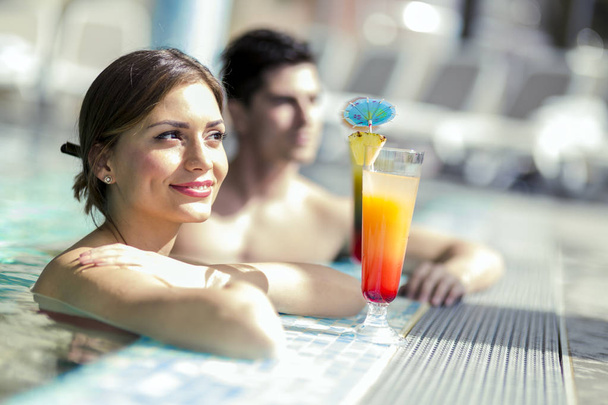 Young people drinking cocktails  - Photo, image