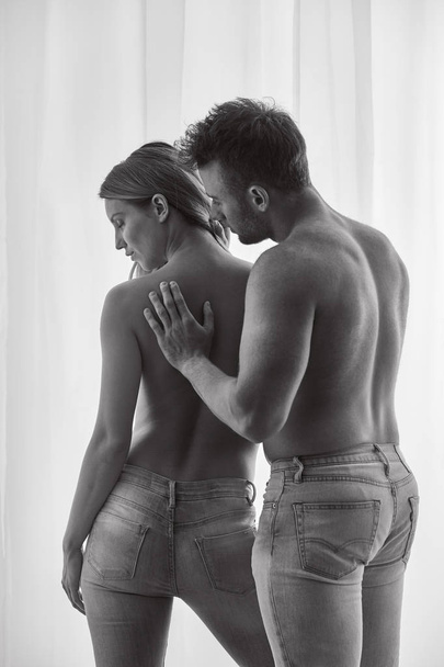 Man touching woman's back - Photo, Image