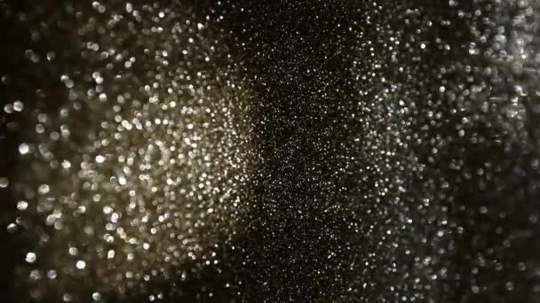 Footage of gold, black and silver glitter lights reflections. - Footage, Video