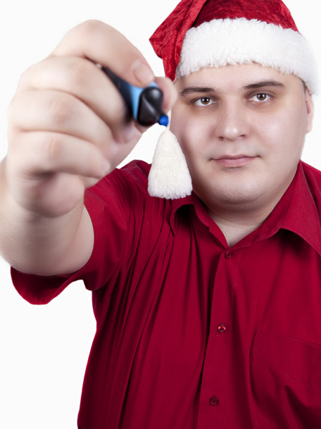 Joven con camisa roja y sombrero de Santa Claus
 - Foto, imagen