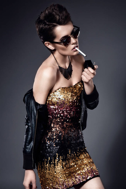 Fashion model smoking cigarette  - Fotografie, Obrázek