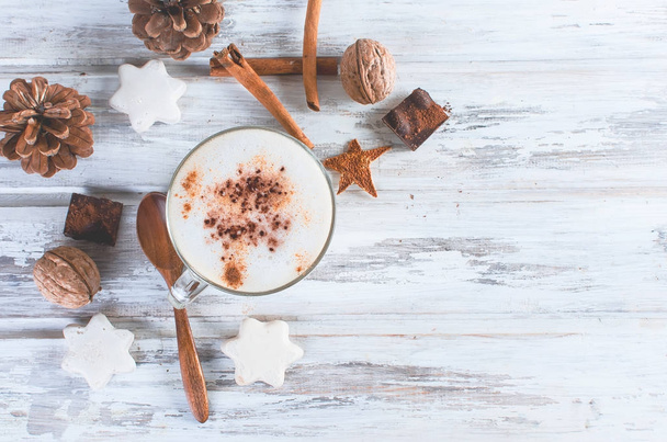 Christmas coffee with milk, spice or hot  cocoa, pine cones  - Fotó, kép
