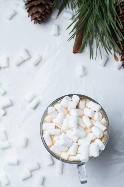 cocoa, coffee with marshmallows, Christmas decorations, white background top view - 写真・画像