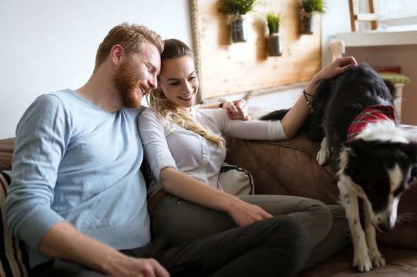  couple  and loving their dog - Foto, imagen